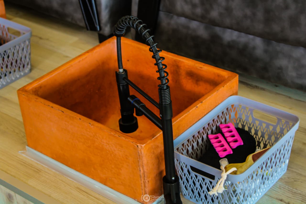 Close-up of pedicure basin and tools